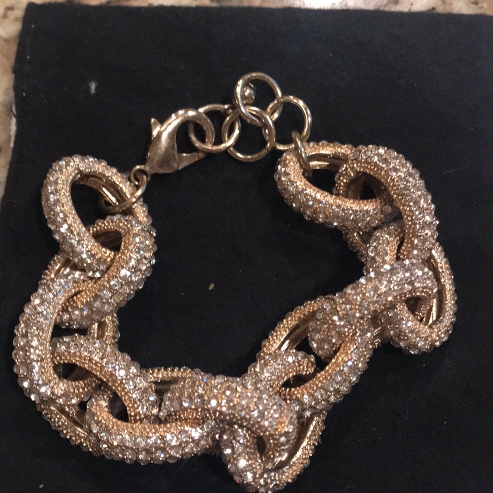 Gold and diamond style bracelet.  Costume jewelry